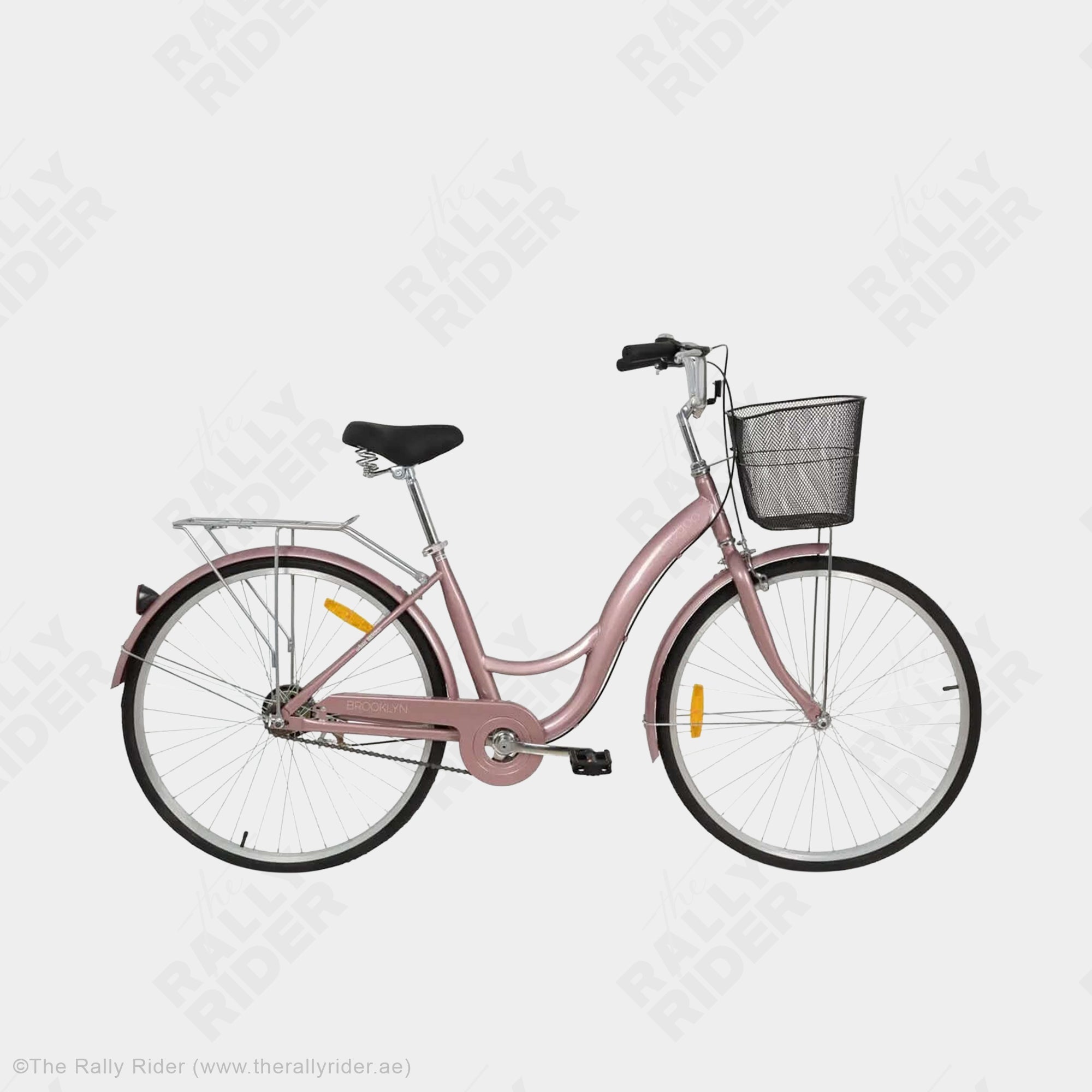 Mogoo Brooklyn city bike in rose gold with front basket, full fenders, and spring-loaded comfort saddle