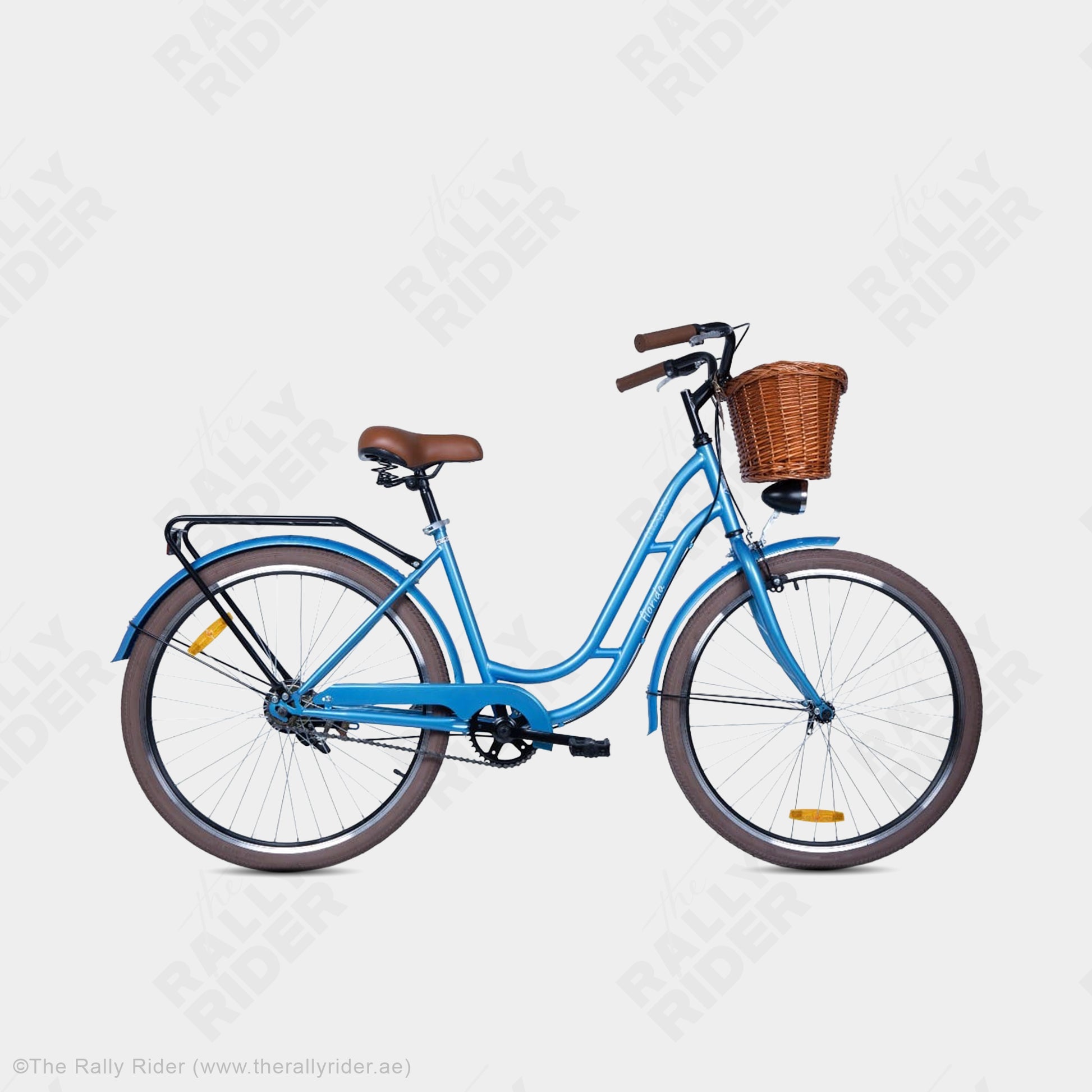 Mogoo Florida step-through cruiser bike in light blue with dynamo headlight, spring saddle, and colour-matched fenders