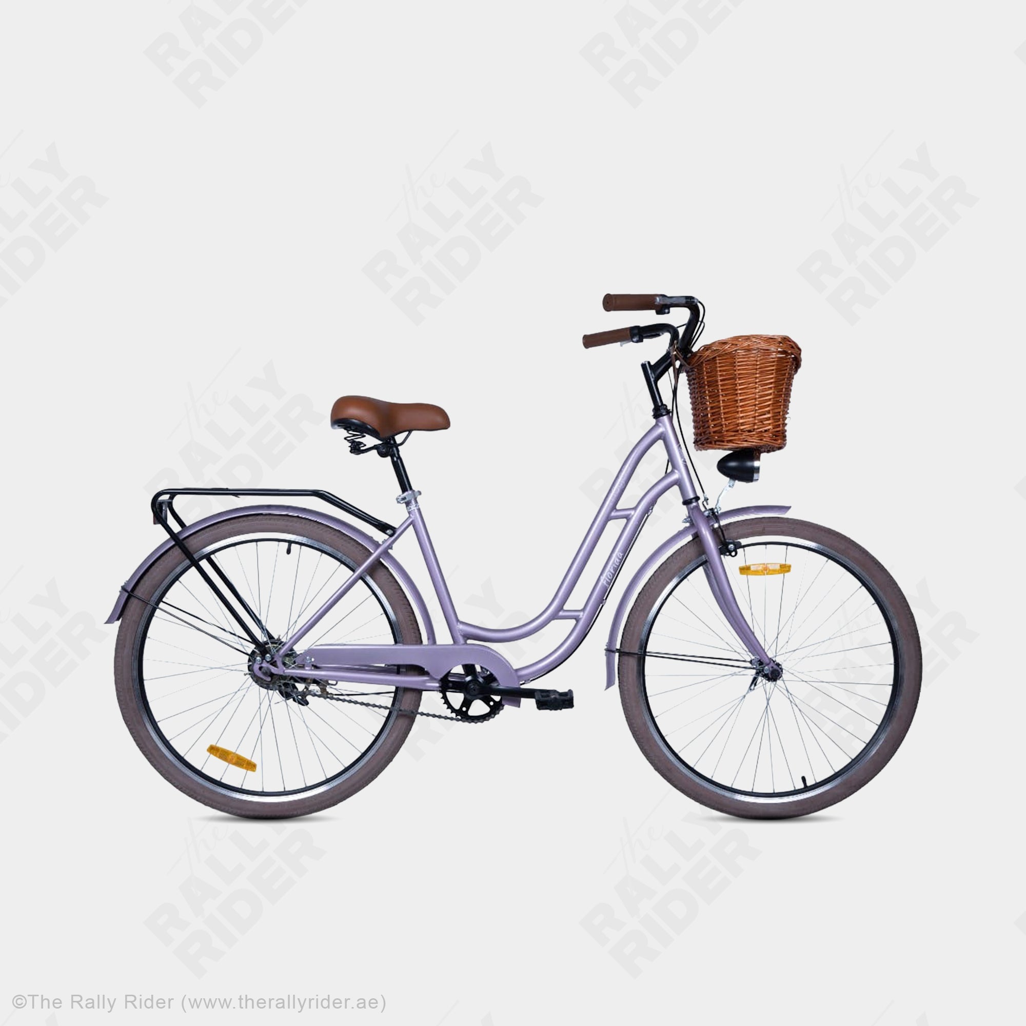 Mogoo Florida classic city bike in lavender with wicker basket, step-through steel frame, and brown saddle