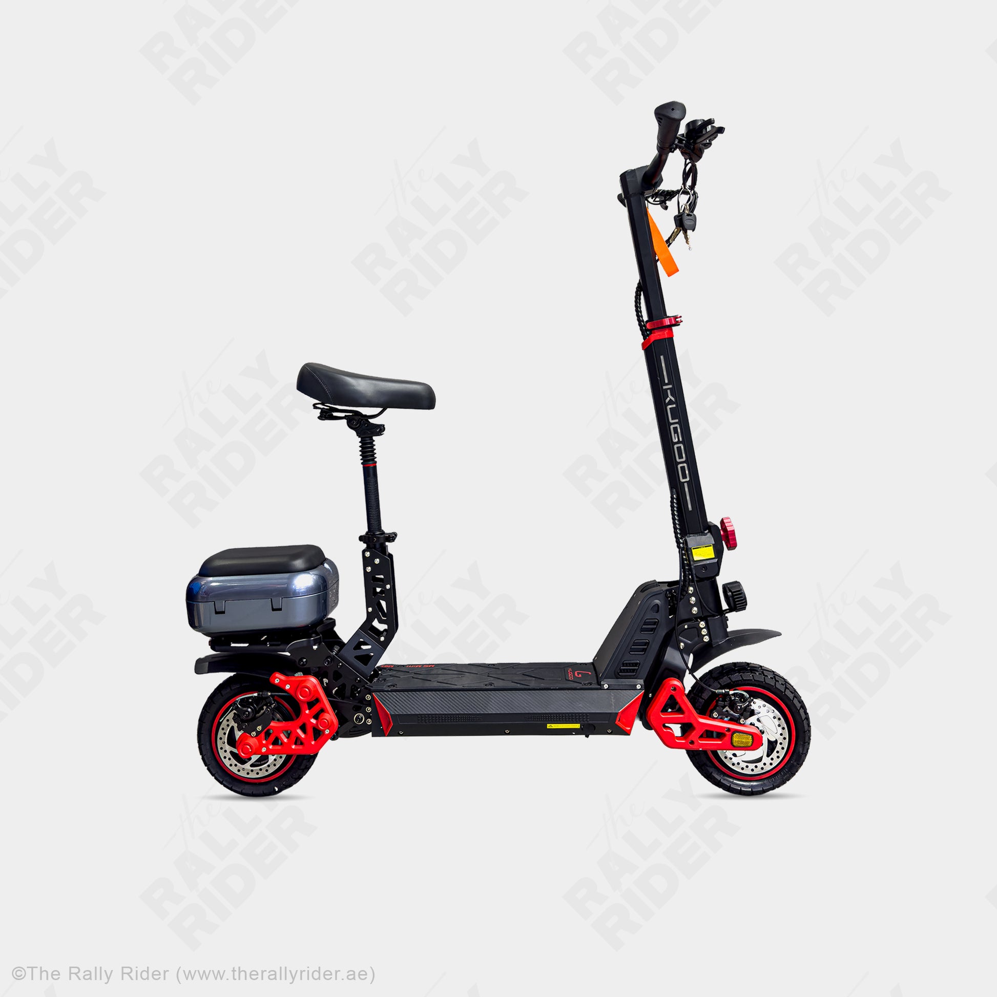 Kugoo M5 Mini Max compact electric scooter in black with red accents, side view with seat and storage box - The Rally Rider Dubai