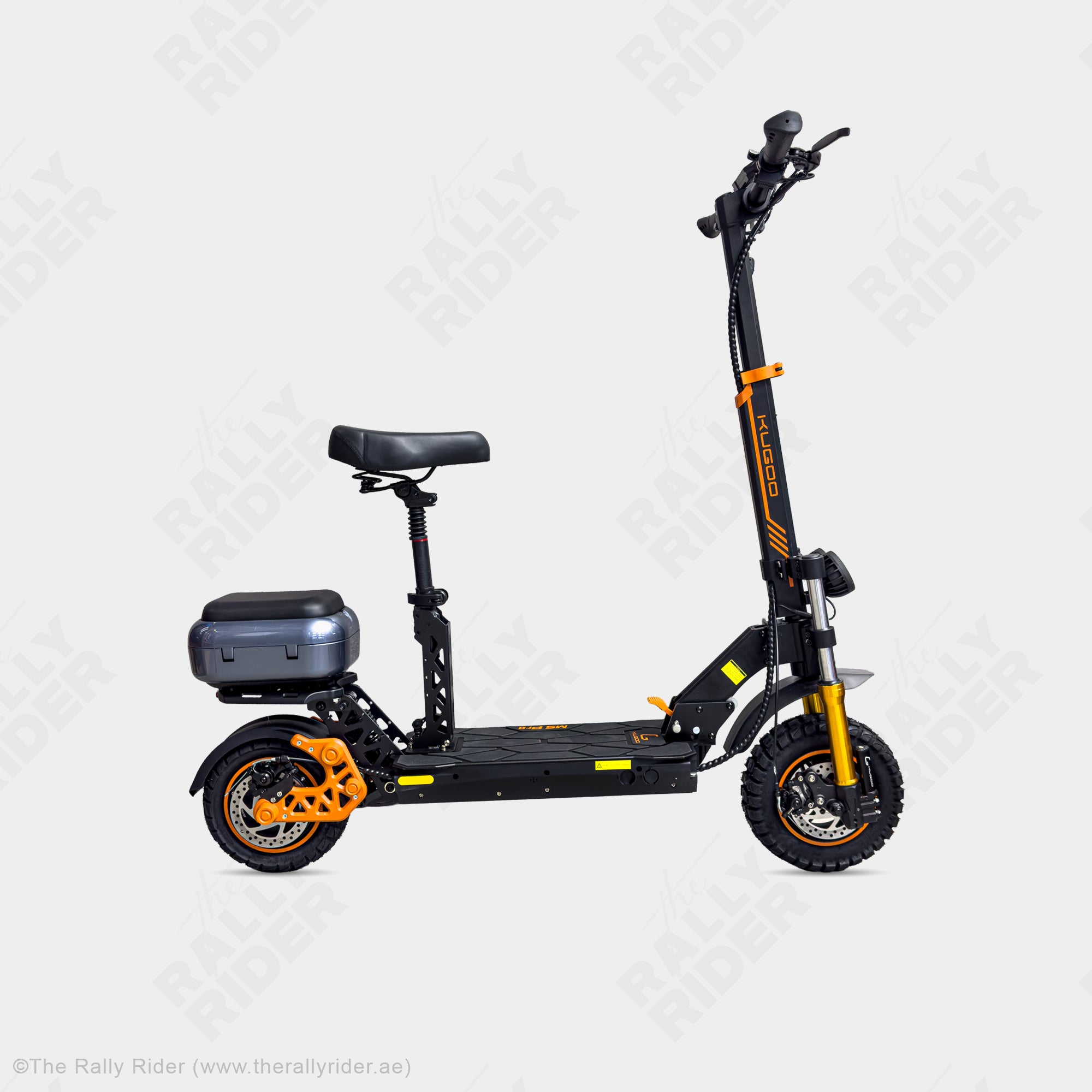 Kugoo M5 Pro electric scooter in black with orange accents, side view with seat and rear storage box — The Rally Rider Dubai