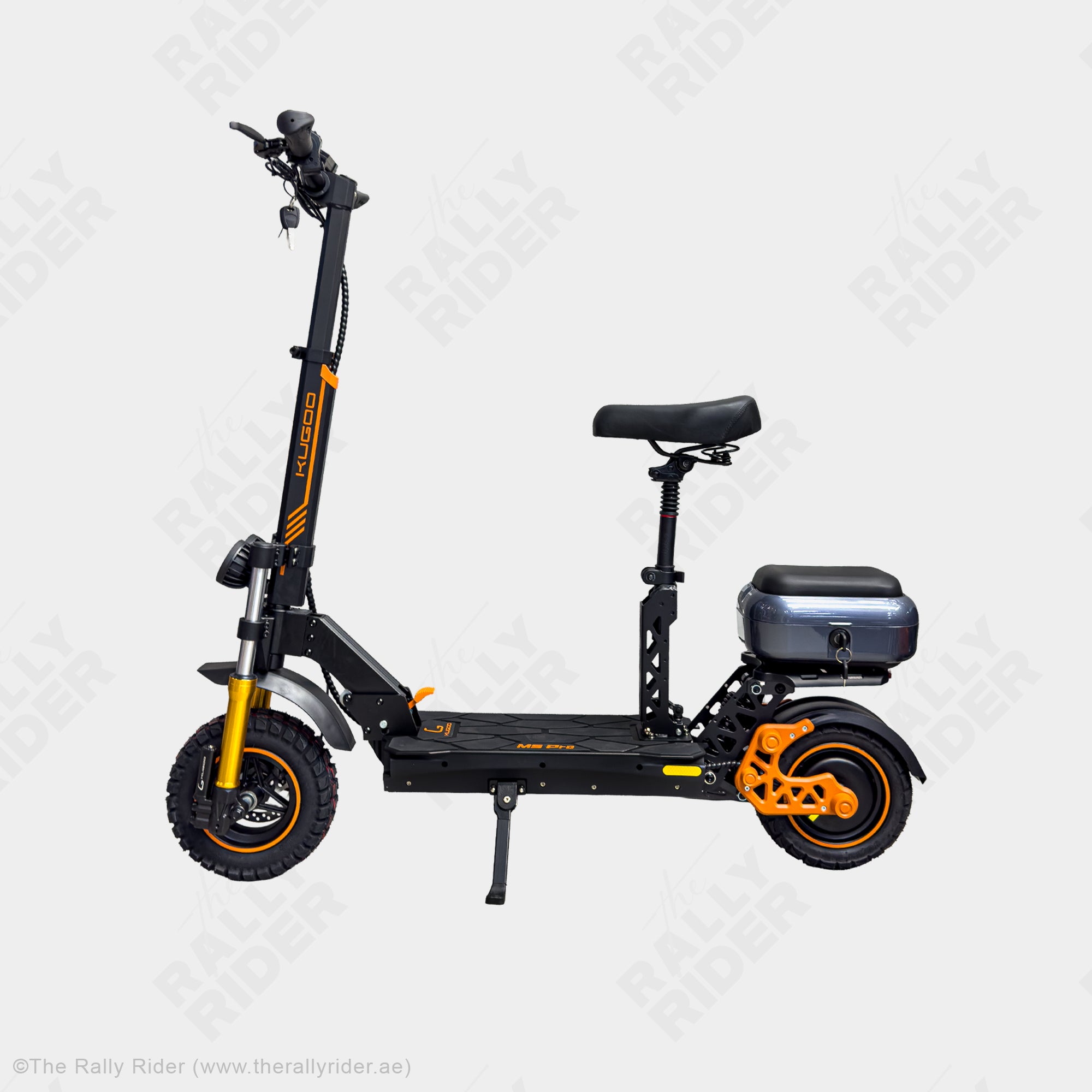 Side profile of Kugoo M5 Pro seated electric scooter with front and rear hydraulic shock absorbers — The Rally Rider
